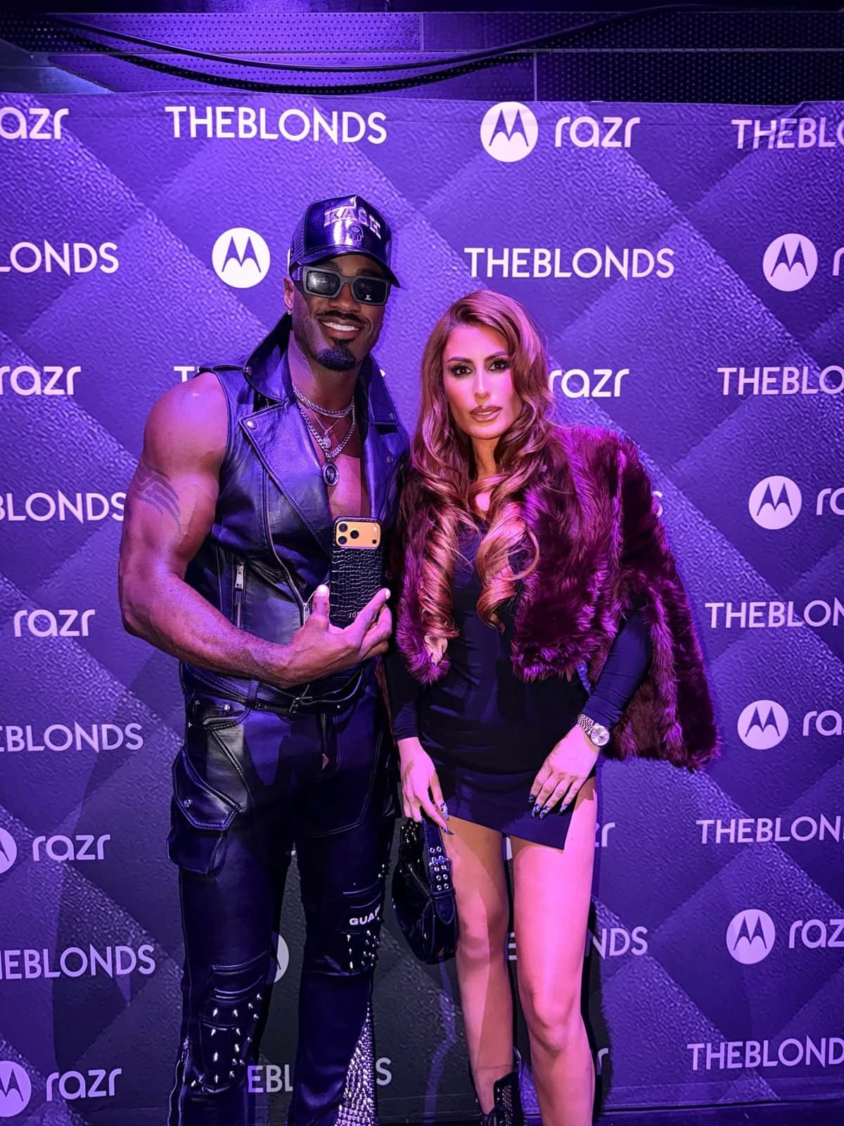Terrell Carter at an event with a JDÉ phone case.